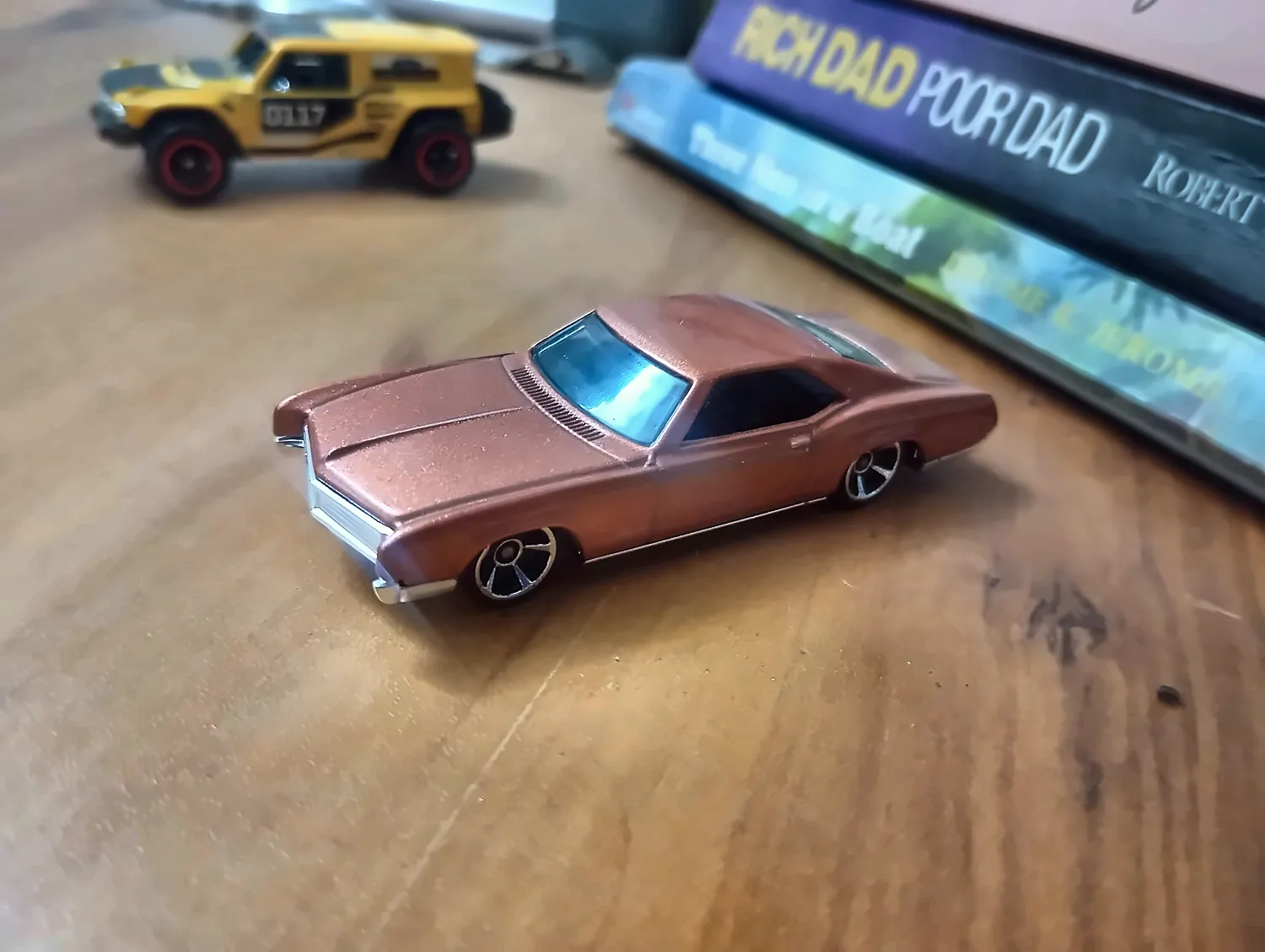 a Hot Wheels Buick on the desk